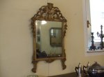 Specchiera Luigi XVI in legno intagliato e laccato con parrti dorate, specchio al mercurio, Italia settentrionale met XVIII sec