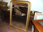 Specchiera in legno dorato,specchio non coevo,Francia met� XIX secolo