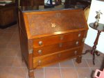 Cassettone Impero  in legno di noce con ribalta, Trento inizio XIX sec.